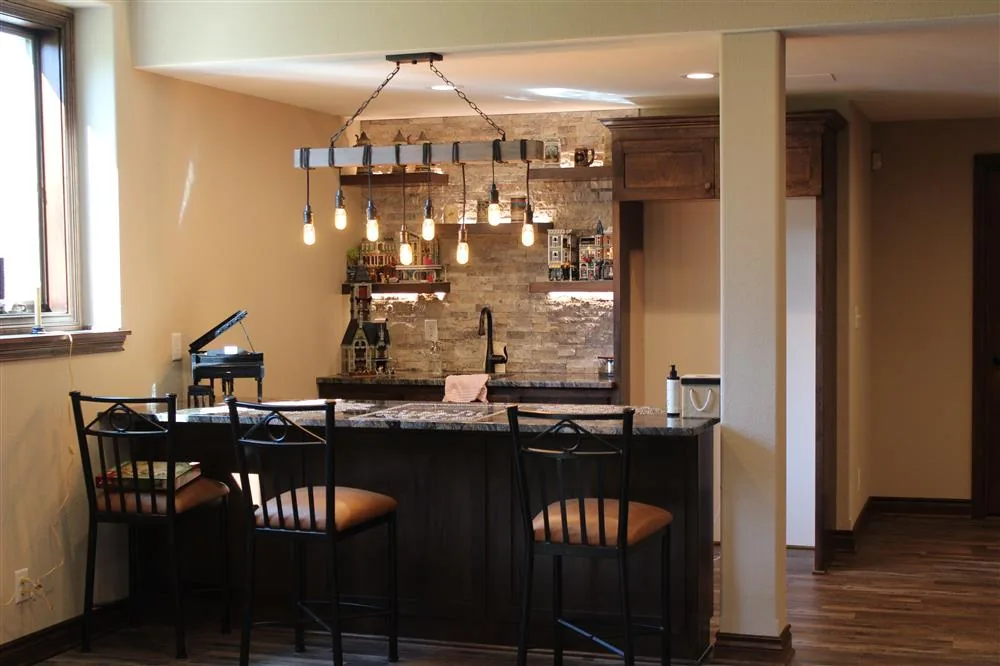 Cedarburg Basement Remodel with a finished bar by Reality Construction