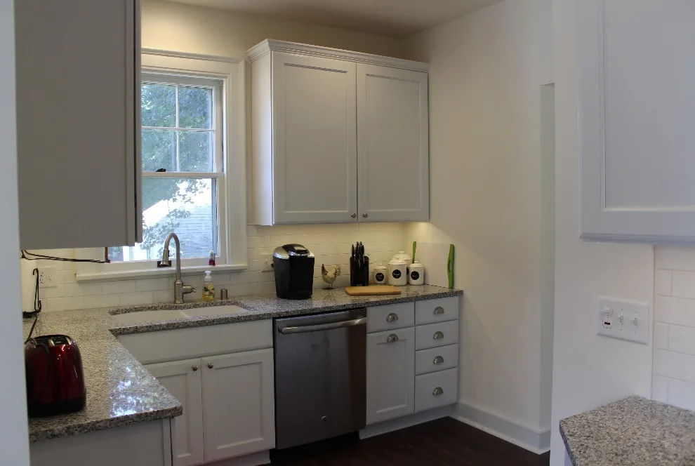 White Hartford Kitchen Remodel by Reality Construction