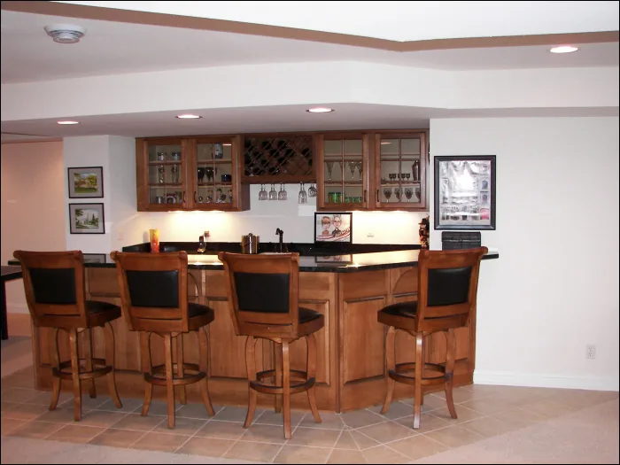 Hartland Modern Basement Bar Remodel by Reality Construction